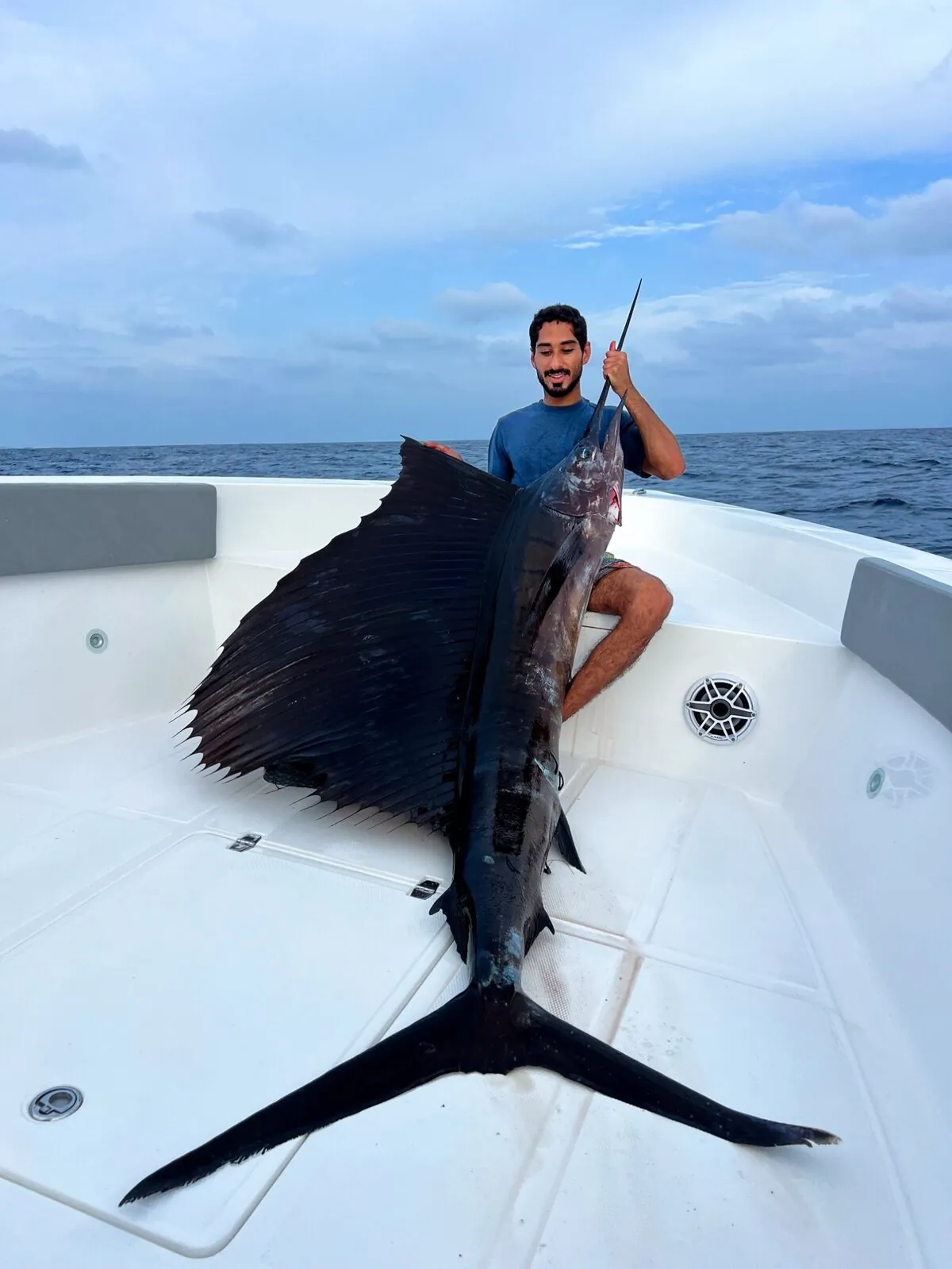 Guests with sailfish caught on charter near Radisson Blu Maldives